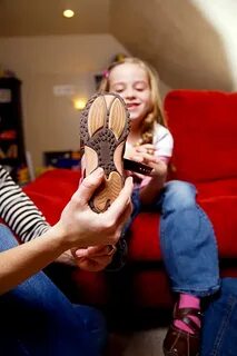 Tickling kid feet