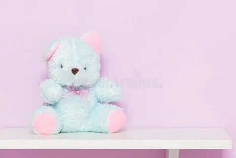 Teddy bear is on the shelf