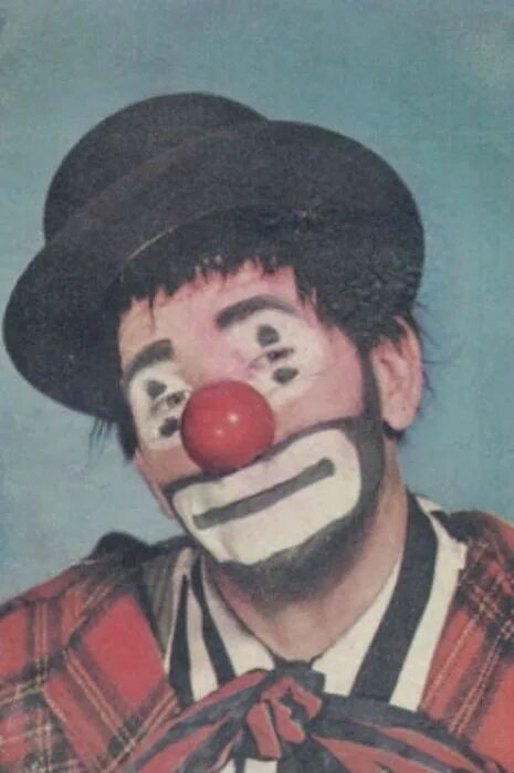 A clown works at a circus