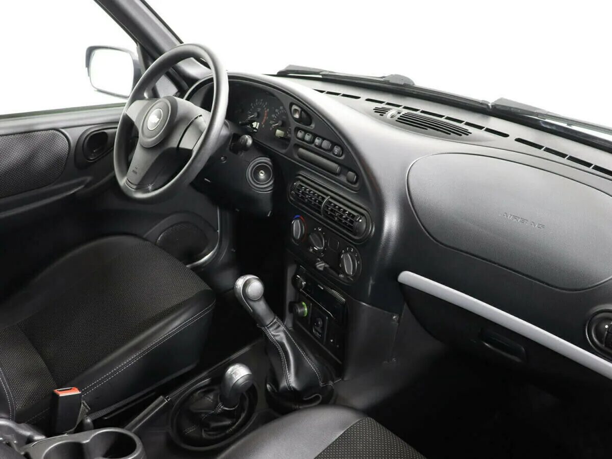 Шевроле нива 1998 салон. Niva chevrolet 2123 салон. Салон нивы шевралет faw1. Нива 2123 салон. Chevrolet niva 2 салон.
