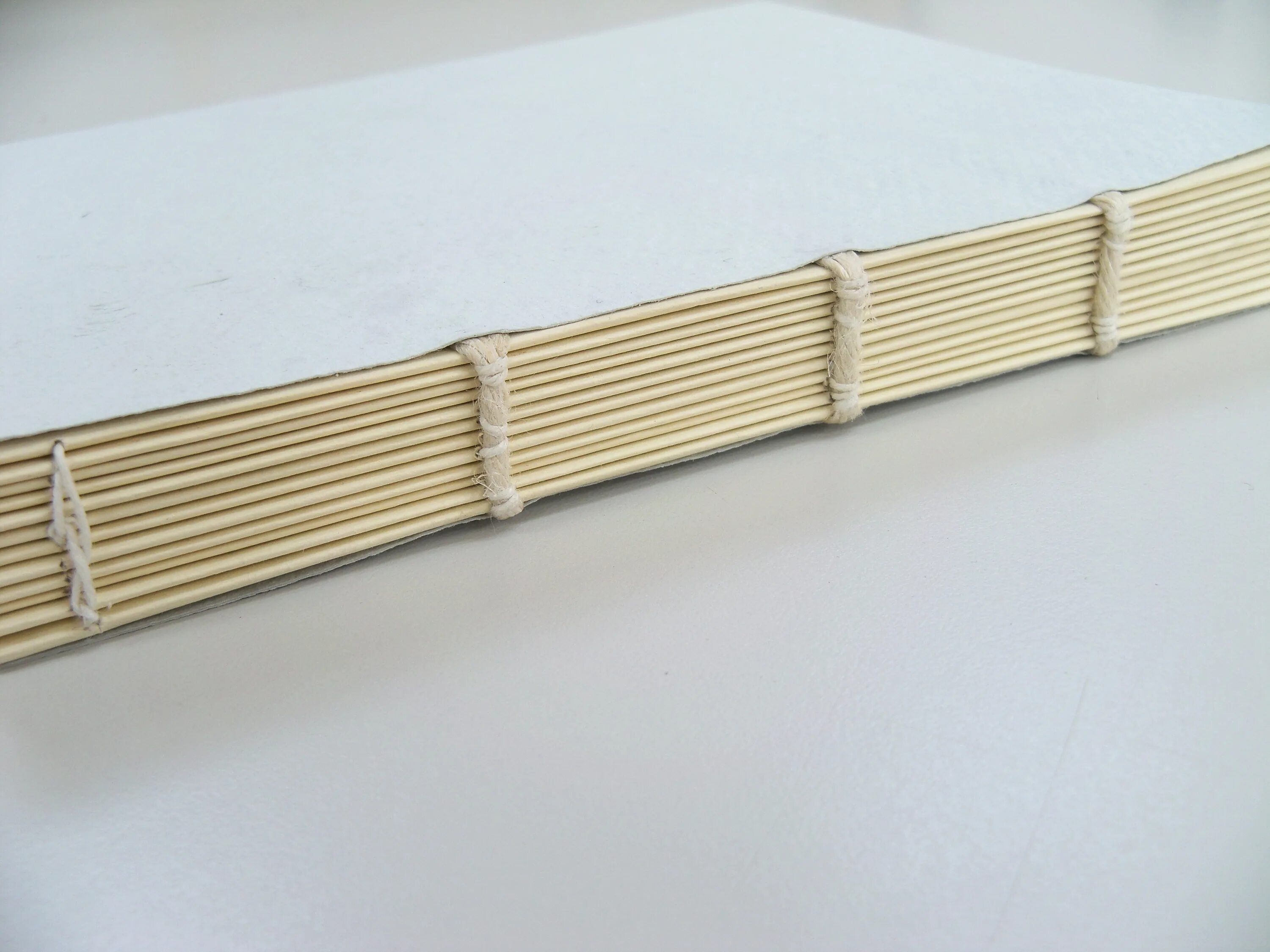 Binding string. Binding strings. binding string varnished.