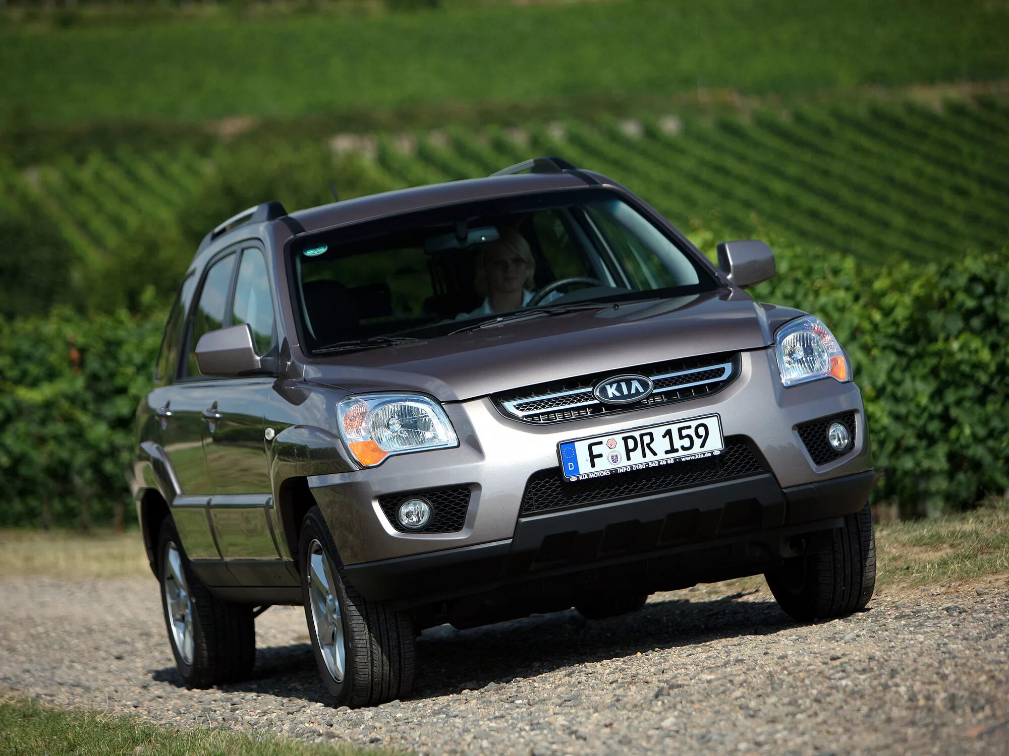 Kia Sportage 2008-2010. Киа Спортаж 2 поколения. Киа Спортейдж 2008 2 поколение. Kia Sportage 2010 2 поколение.