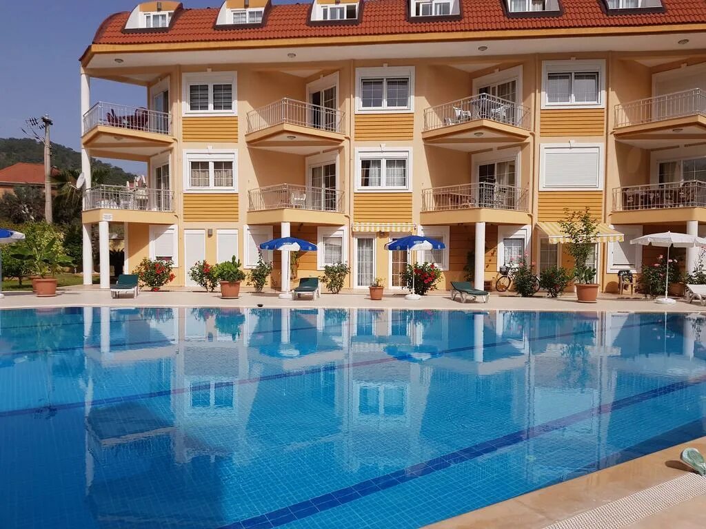 Кемер хаус турция. Отель хераклес кемер. Кемер хаус. Pine hotel турция кемер. Sultan homes apartments кемер.