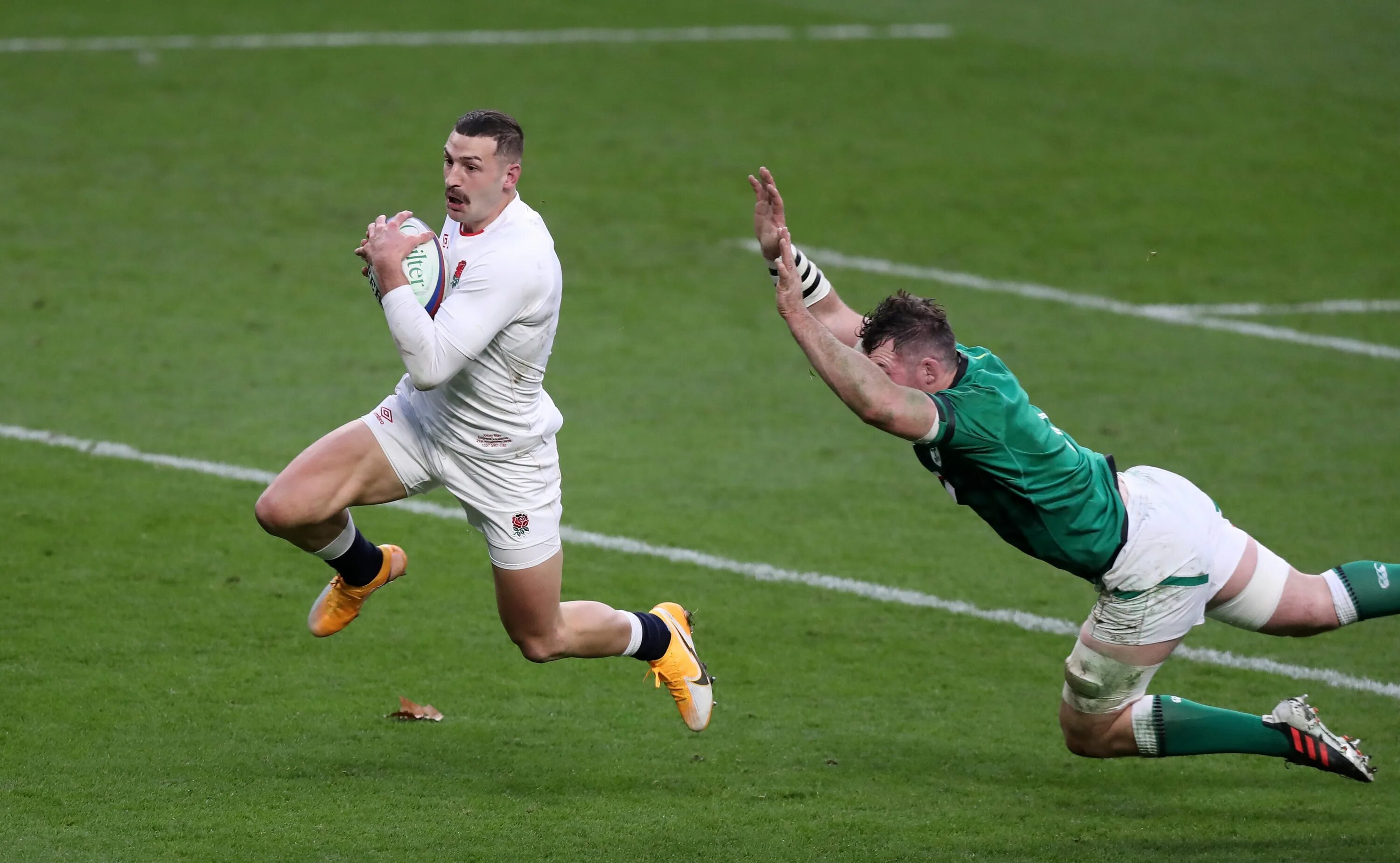 He runs well. English Rugby referees.