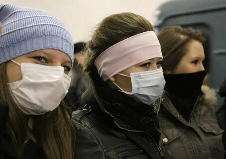 Медсестер в марлевых повязках