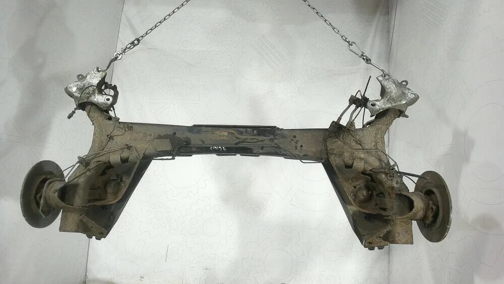 Задня балка рено сценик. Рено сценик 2000г задняя подвеска. Сценик 2 задняя подвеска. Балка рено логан. Задняя балка рено меган 1.