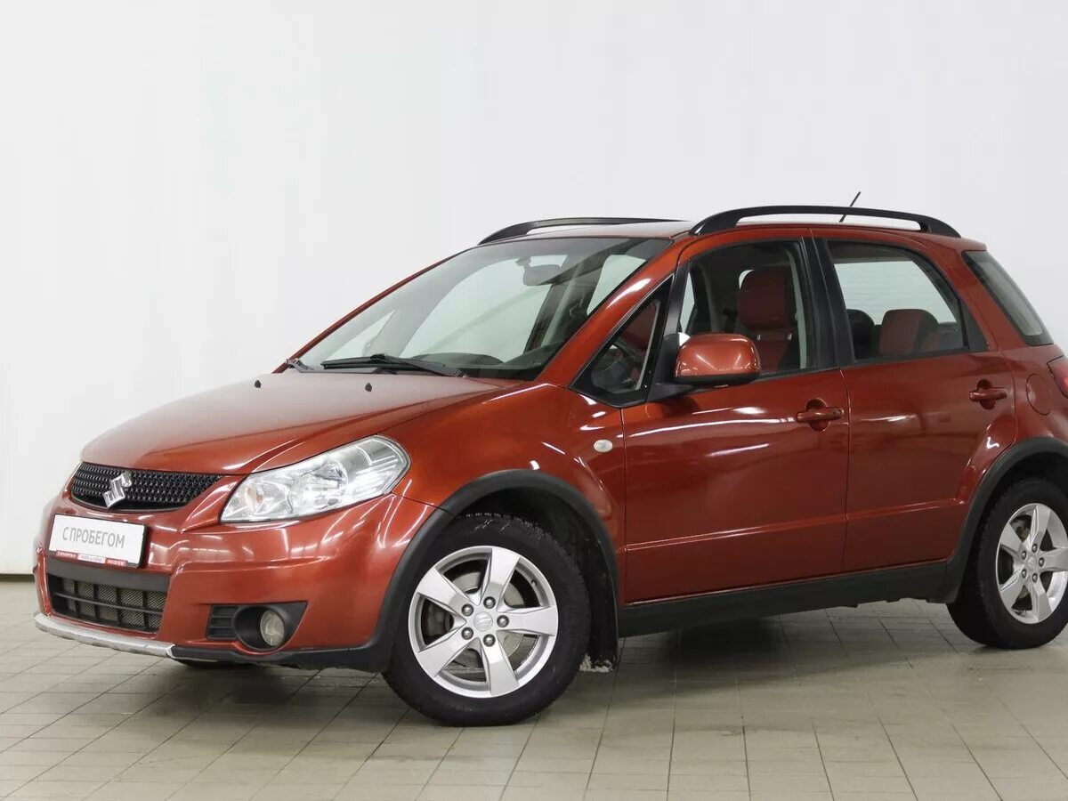 6. Suzuki sx4 универсал. Suzuki sx4. Suzuki sx4 2014 комплектации. Сузуки оранжевого цвета.