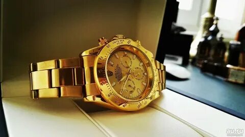 Мужские дорогие золотые часы.