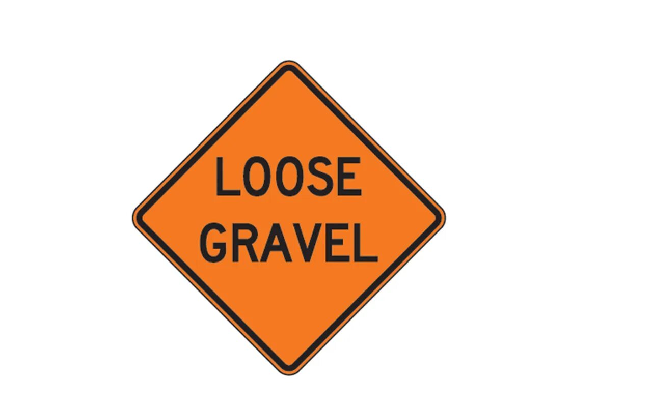 Road closed. Loose Gravel sign. Road and Construction signs. Construction sign.