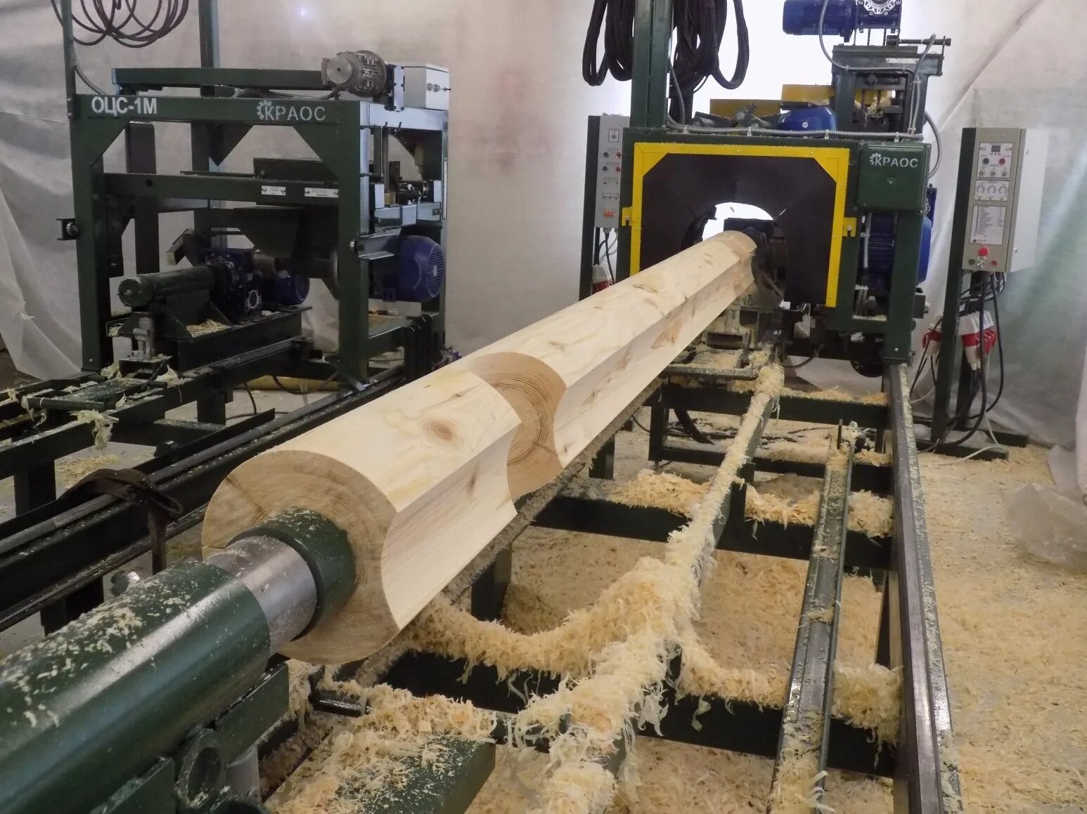 механическая деревообработка. шервуд станки деревообрабатывающие оцилиндрованного бревна. станок для фрезерования слэбов. механическая обработка древесины. механическая деревообработка.