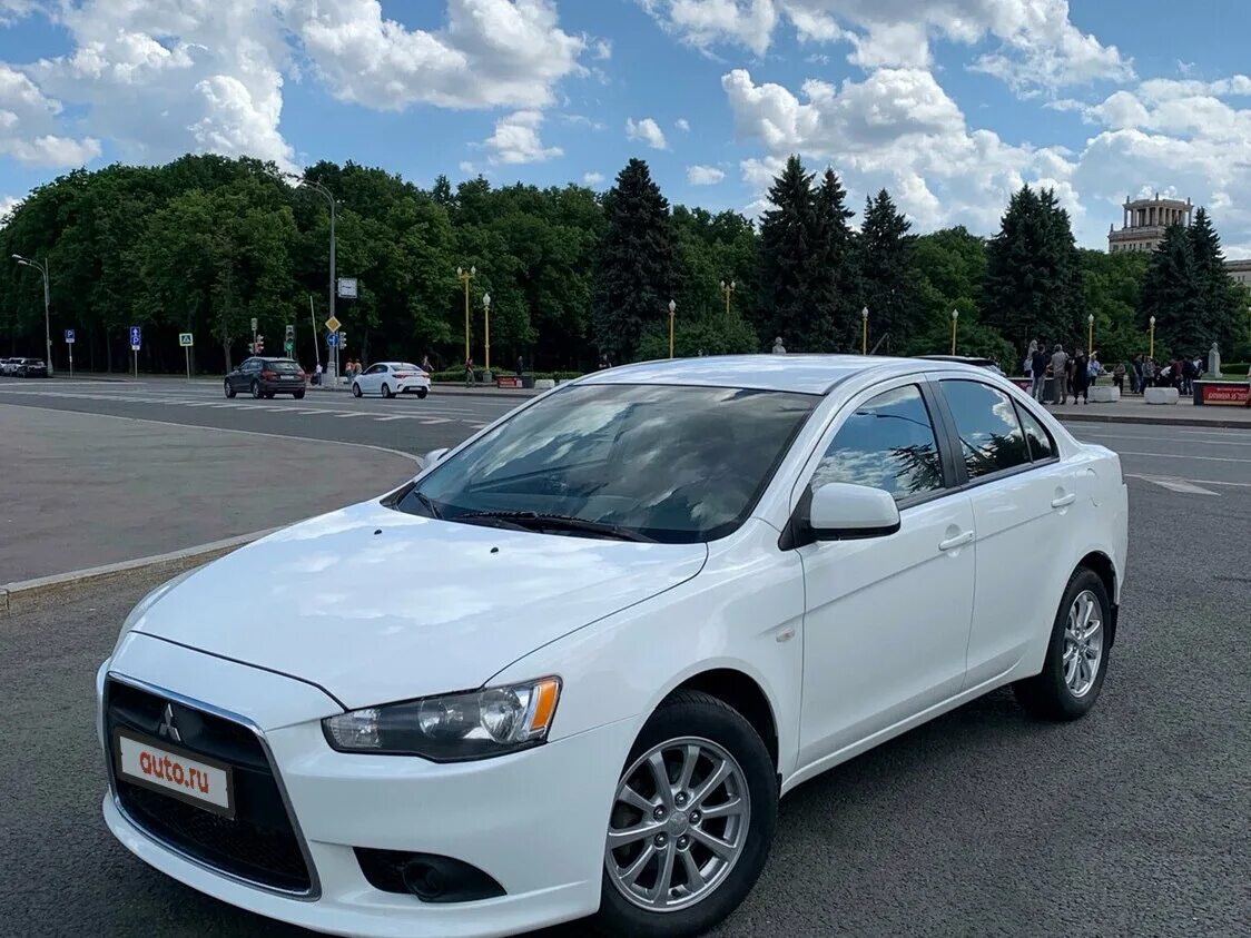 Купить лансер в московской области. Mitsubishi Lancer 2013. Митсубиси Лансер 2013. Митсубиси Лансер x 2013. Mitsubishi Lancer x Рестайлинг 2013.