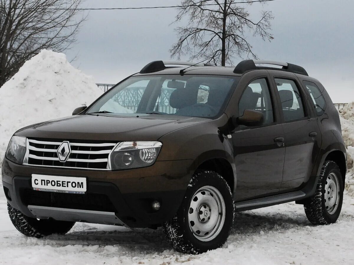 Купить дастер 2012г. Renault Duster 2012. Renault Duster 2012-2015. Коричневый Дастер 2012. Рено Дастер 2012 фото.