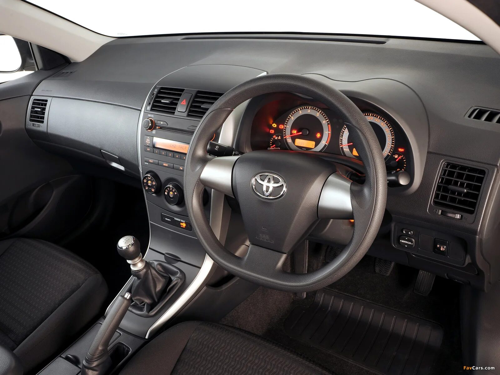 Тойота руками фото. Toyota corolla s 2010 salon. toyota corolla 2010 салон. toyota corolla za-spec 2010. тойота королла 2010 салон.