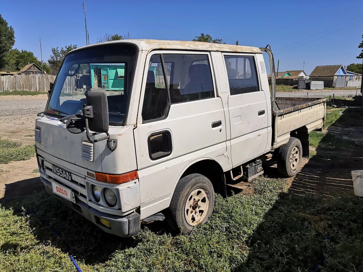 Грузовичок ниссан. Nissan Atlas 1990. Nissan Atlas 100. Nissan Atlas 1990 год. Nissan Atlas 4wd 1990.