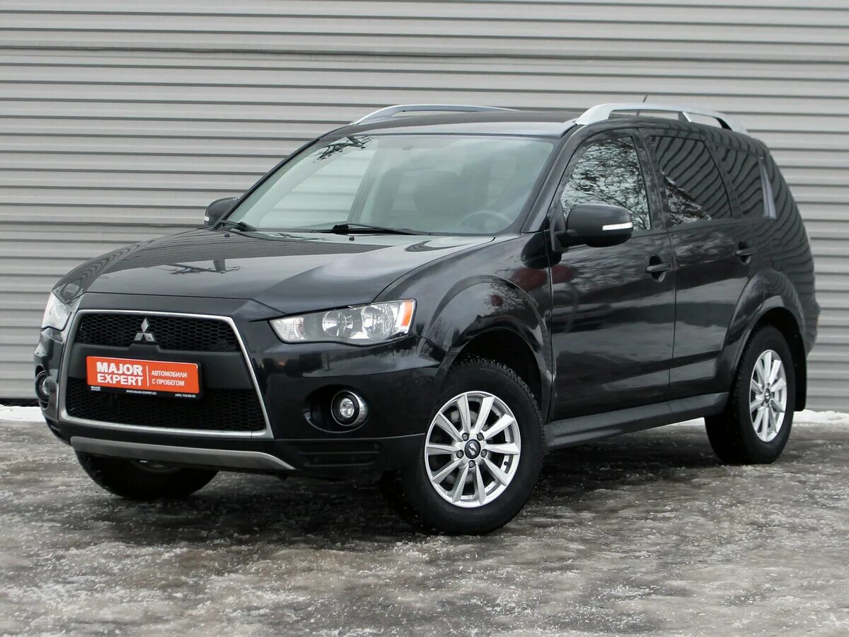 Mitsubishi Outlander 2010. Митсубиши Аутлендер 2010. Mitsubishi Outlander XL 2 поколение. Mitsubishi Outlander 2010 черный.