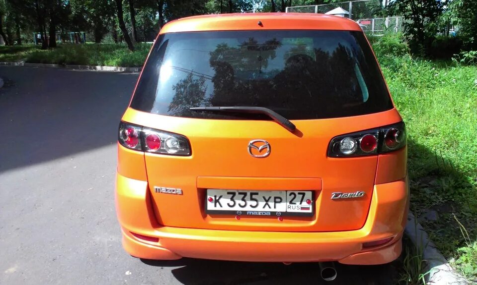 Mazda demio 2003 задняя фара. Mazda demio dw. Мазда демио задние фонари. Задний фонарь на мазда демио 2003. Лампа стоп сигнала мазда демио dw3w.