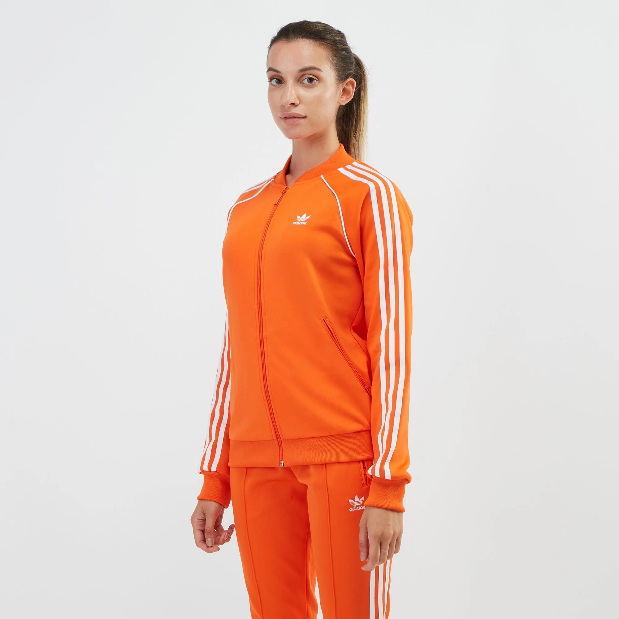 Костюм адидас SST оранжевый. Adidas Originals - Orange Tracksuit. Оранжевый адидас костюм жакет. Адидас оранжевые.