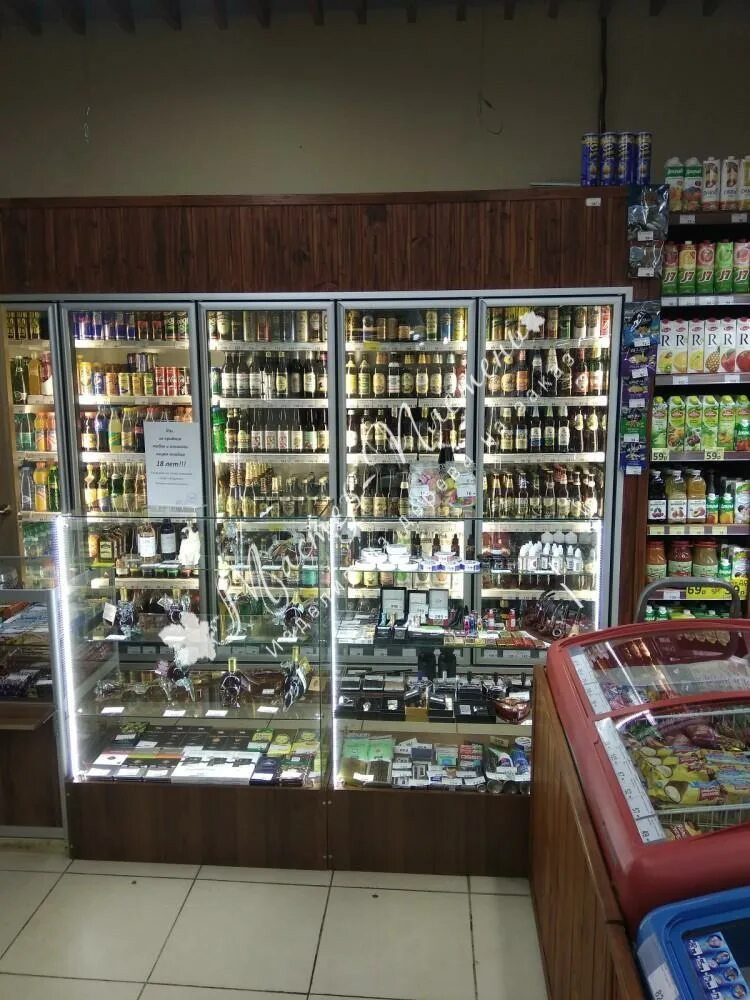 Айджой шогун. Жидкость learmonth castleberry. Прилавки для вино водочного магазина. Магазин апельсинка. Виноводочный отдел в магазине.