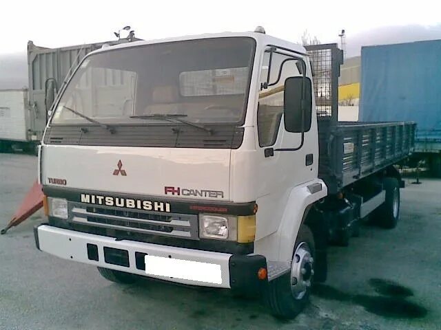 Митсубиси файтер купить. Mitsubishi Fuso FK 1988. Мицубиси Фусо 1990. Митсубиси Fuso Truck 1993. Mitsubishi Fuso fk335.