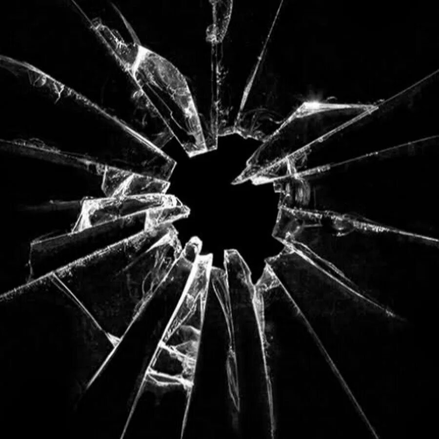 Эффект трещина. Разбитое стекло. Треснутое стекло. Эффект разбитого стекла. Трещины стекла на черном фоне.