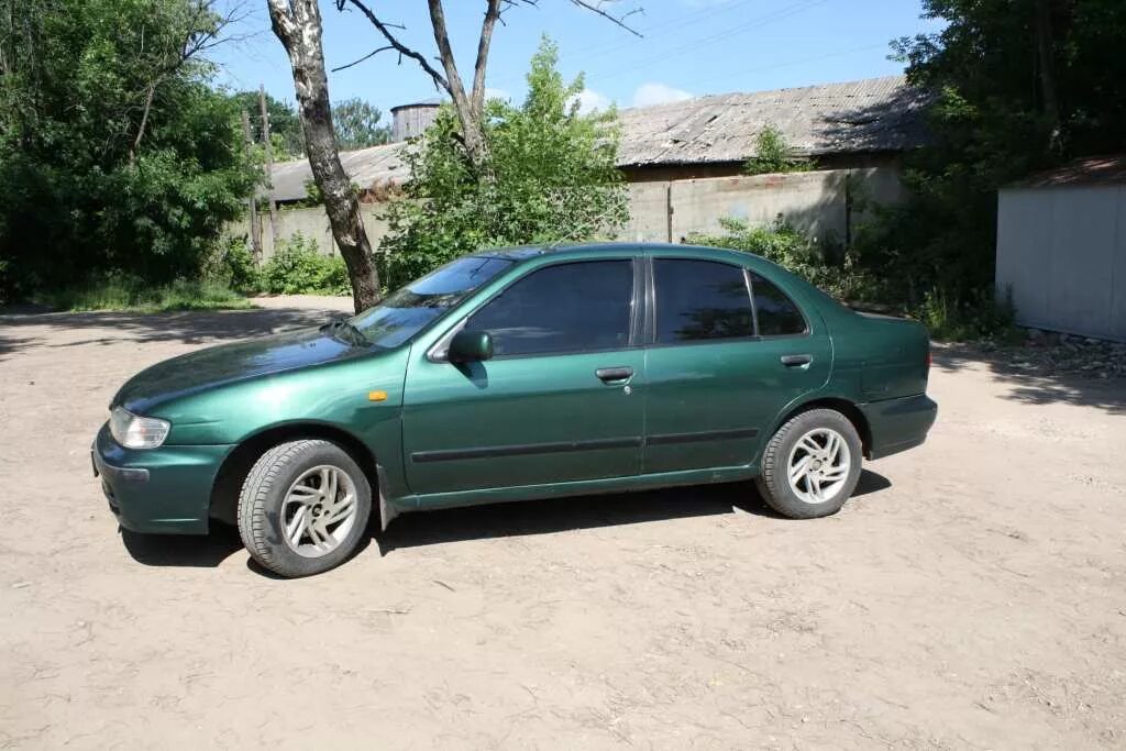 Nissan Almera 1.6 мт1999. Ниссан Альмера н15 1999. Ниссан Альмера н15 зеленый. Ниссан Альмера н15 зеленый седан.