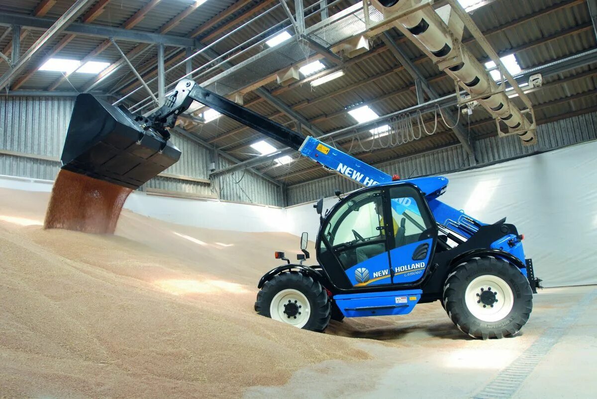 Каталог запчастей new holland w190. Holland погрузчик. Погрузчик new holland l225 джойстик. Мини-погрузчик new holland l330. Минипоргузчик холланд.
