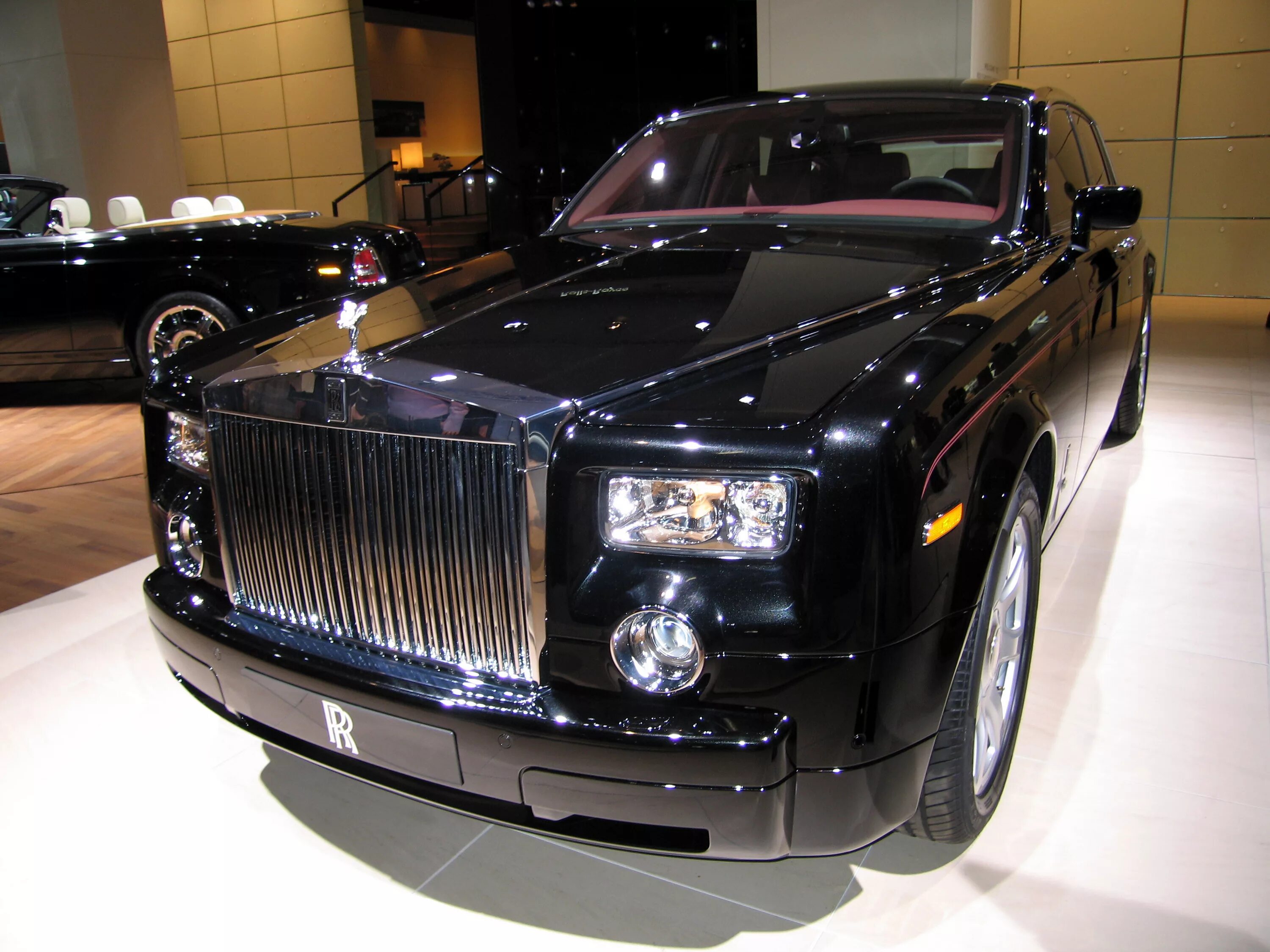 Rolls история. Rolls Royce 2003. Роллс Ройс Фантом 2007. Роллс Ройс Фантом 2003 EWB. Rolls Royce Phantom 2012.