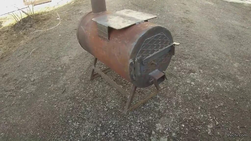 пиролизная печь буржуйка. печь из баллона на дровах. буржуйка из газового баллона на дровах длительного горения. печь длительного горения из буржуйки. печь из пропанового баллона длительного горения.