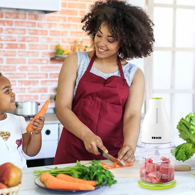 Исцеляющая еда. Mum with children Cooks. Woman who eating with Family wearing Accessories. A teen boy Cooking with mum.