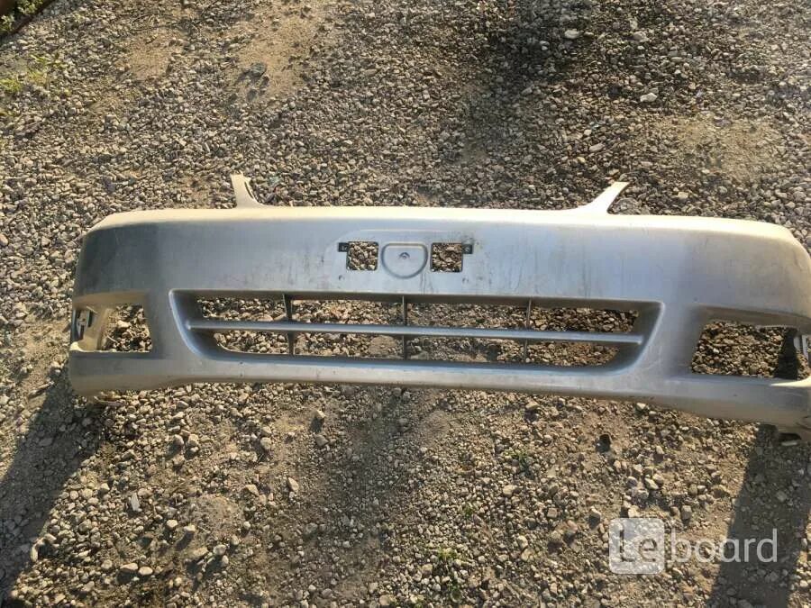 Бампер передний тойота филдер 141 кузов маркировка пластика. 120 кузов бампера. Toyota corolla e120 бампер. Бампер тойота королла 120. Бампер на тойота королла 120 кузов.