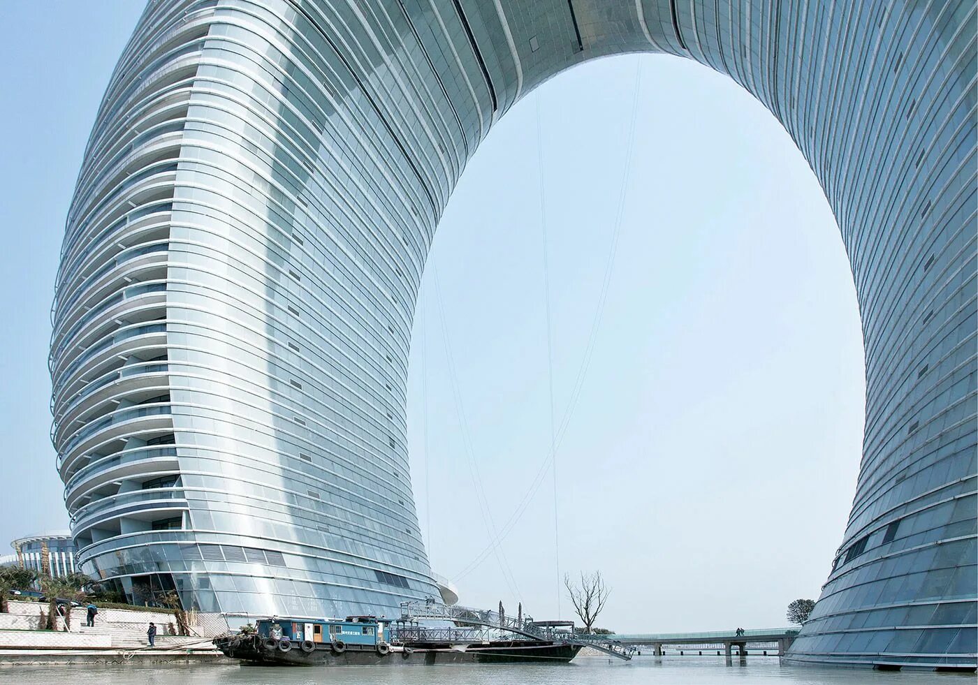 Уникальное строительство. Архитектура Шератон Хучжоу. Отель Sheraton Huzhou, Китай. Отель Шератон в городе Хучжоу. Отель «Шератон Хучжоу» в Китае.