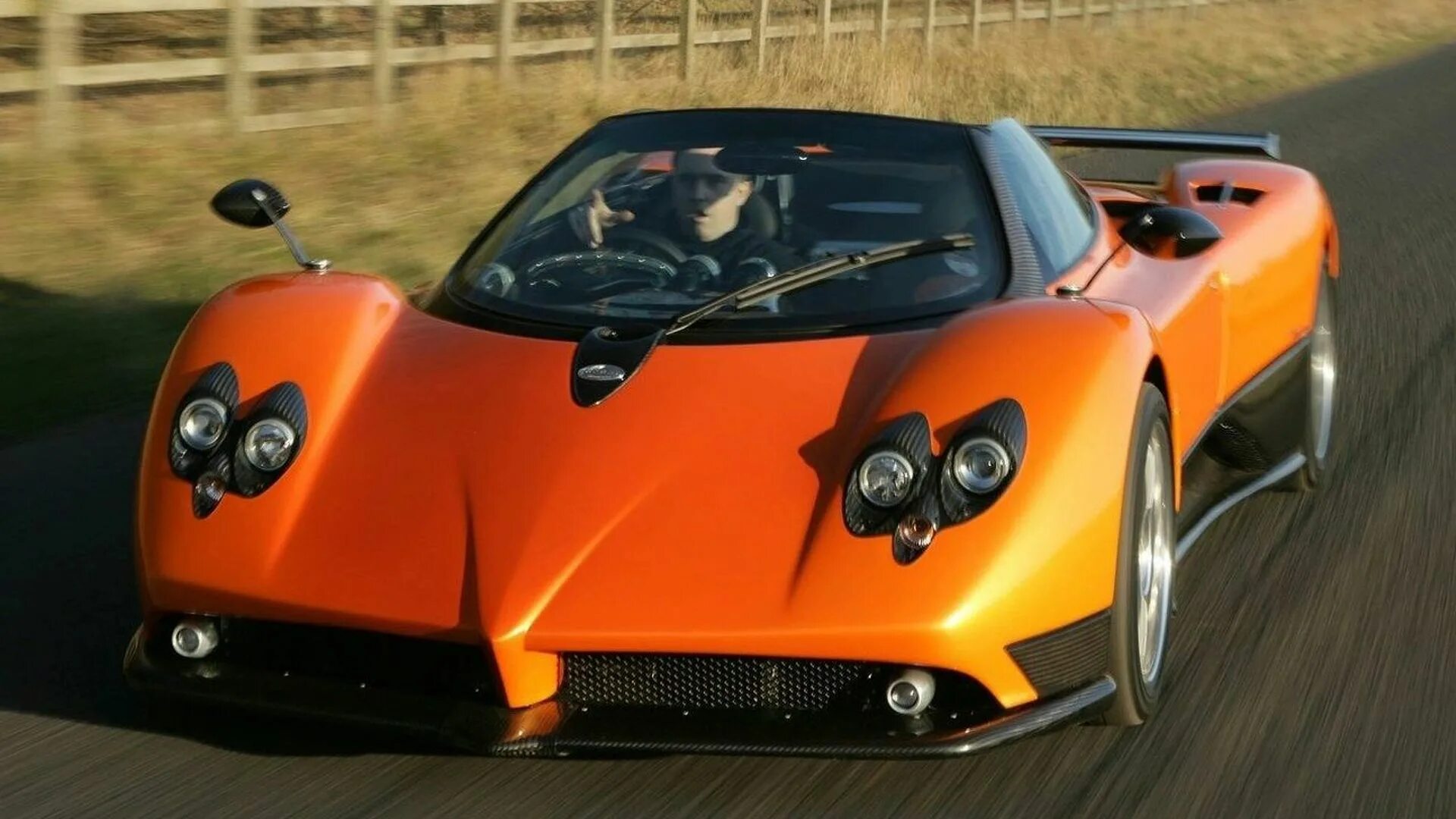 Зонда 2013. Пагани зонда родстер f. Pagani Zonda Orange. Test Drive Pagani. Pagani Zonda тест драйв.