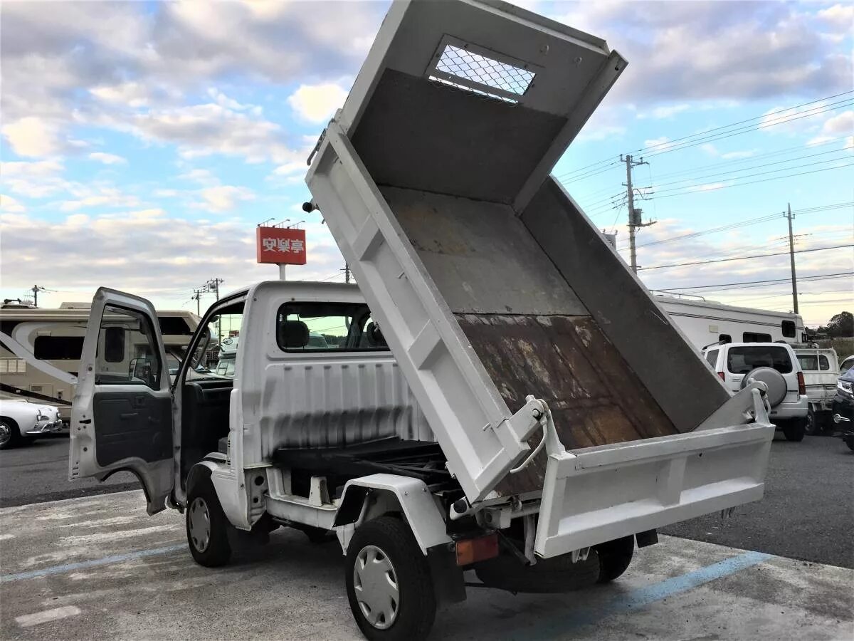 Мазда титан. Исузу эльф 4х4 самосвал. Mitsubishi canter 4wd. Кузов самосвал на исузу эльф 4 вд. Mazda bongo 4wd truck.