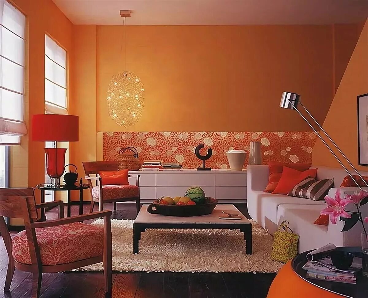 Оранжево черный интерьер. Гостиная в оранжевом цвете. Оттенки оранжевого в интерьере. Оранжевые стены в гостиной. Оранжевый цвет по другому