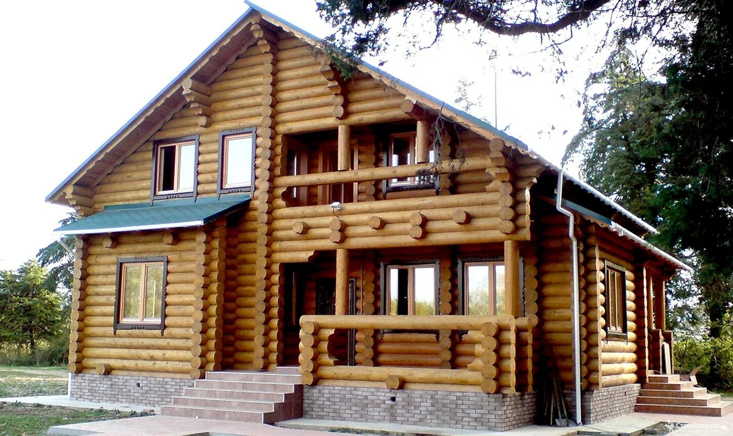 Проект дома из бруса. Деревянные дома октябрьский. Дома из дерева. Тиккурила 5064 оцилиндрованного бревна. Проекты рубленных домов.