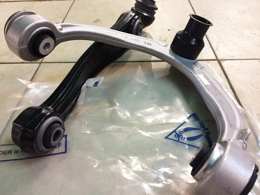 Передний рычаг бмв х5 е70 продольный. Передний рычаг е53. Рычаг бмв х5 е70. Задние рычаги бмв х7. Нижний рычаг бмв ч 5 у 70.