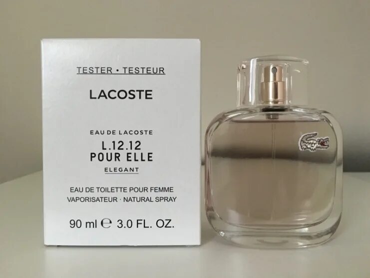 Озон интернет магазин духи. Lacoste l. 12.12 pour elle Elegant EDT (W) 90ml Tester. Тестер Lacoste Eau de Lacoste. Женские духи лакост12.32. Духи лакост Пур Элле Элегант.