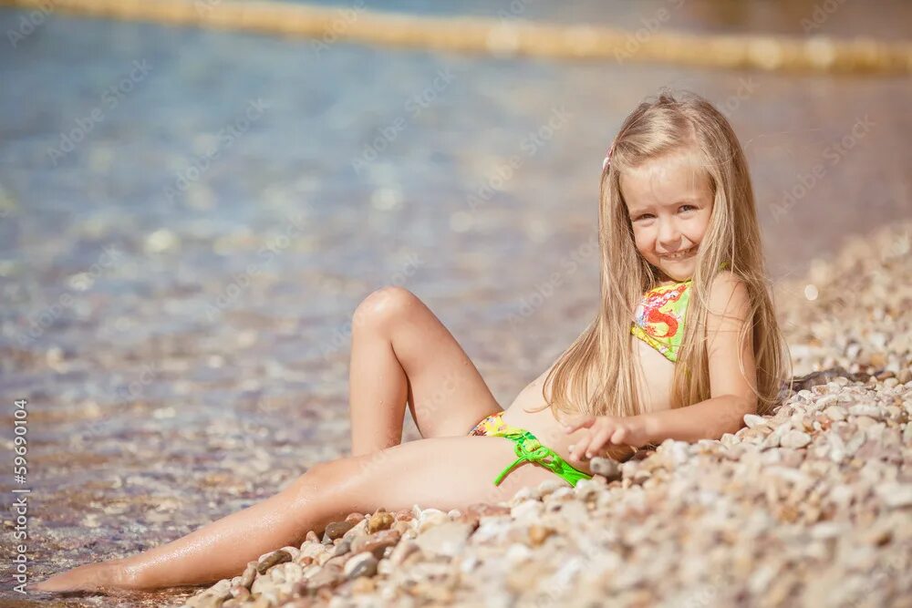 Child at beach in summer stock image. Image of childhood - 19999179
