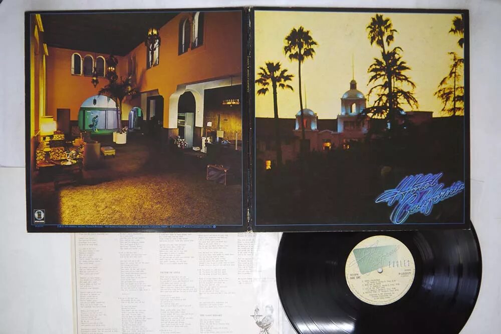 Hotel california альбом. Eagles hotel california обложка. eagles hotel california 1976. eagles hotel california 1976 обложка. eagles hotel california 1976 альбом.