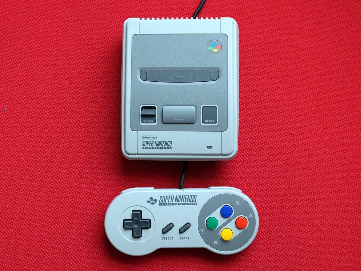 Super nintendo download. Приставка super Nintendo. Приставка Нинтендо NES. Приставка консоль Nintendo NES. Нинтендо супер Нинтендо.