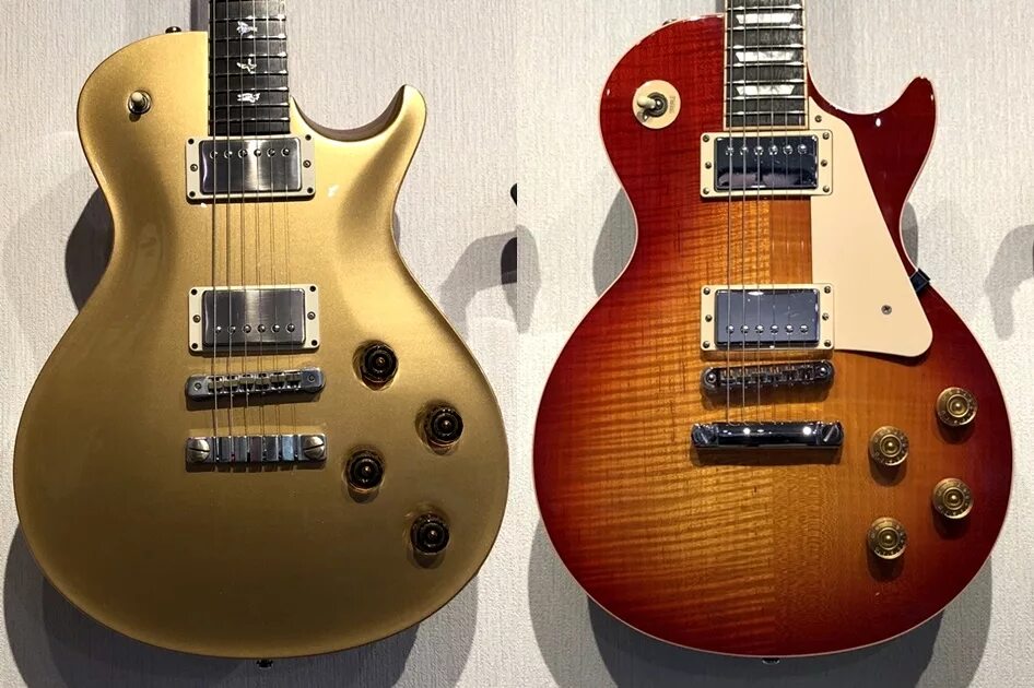 Гитара prs les paul. Epiphone vs gibson headstock. Gibson vs gibson. Fender gibson электрогитара. Gibson vs gibson.