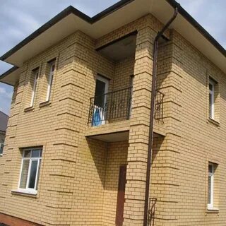 Дом облицованный кирпичом