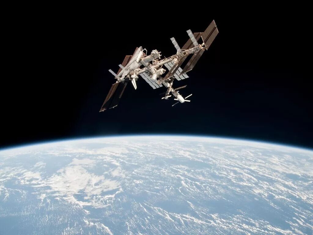 Международная космическая станция находящаяся на околоземной орбите. Космическая станция МКС. Международная орбитальная Космическая станция. МКС на орбите земли. Космическая станция НАСА.