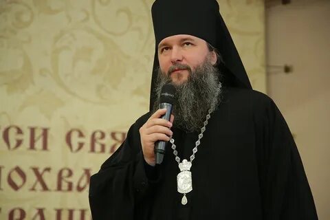 Теолог