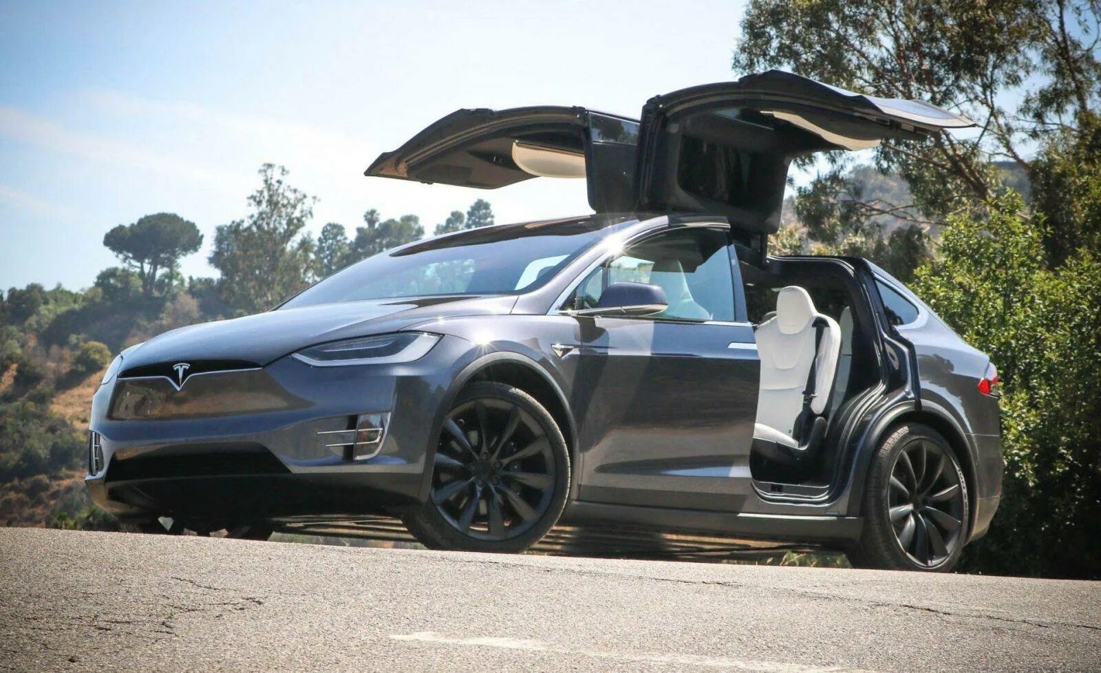 Тесла х. Tesla model x 2019. электромобиль tesla model x. тесла model x 2025. машина tesla model x 2018.