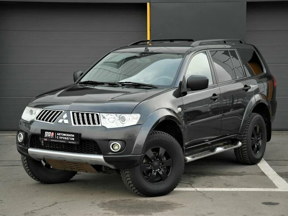 Mitsubishi sport отзывы. Митсубиси Паджеро спорт 2010. Митсубиши Паджеро спорт 2010. Mitsubishi Pajero Sport 2010 года. Mitsubishi Pajero Sport 2010 черный.