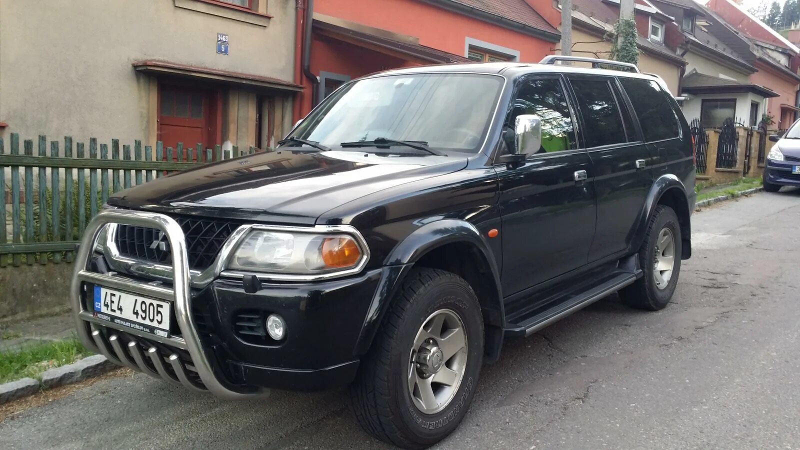 Mitsubishi pajero sport бензин. Mitsubishi Montero Sport 2003. Mitsubishi Pajero Sport 2003. Митсубиси Монтеро спорт 2000 черная. Mitsubishi Pajero Montero Shogun.