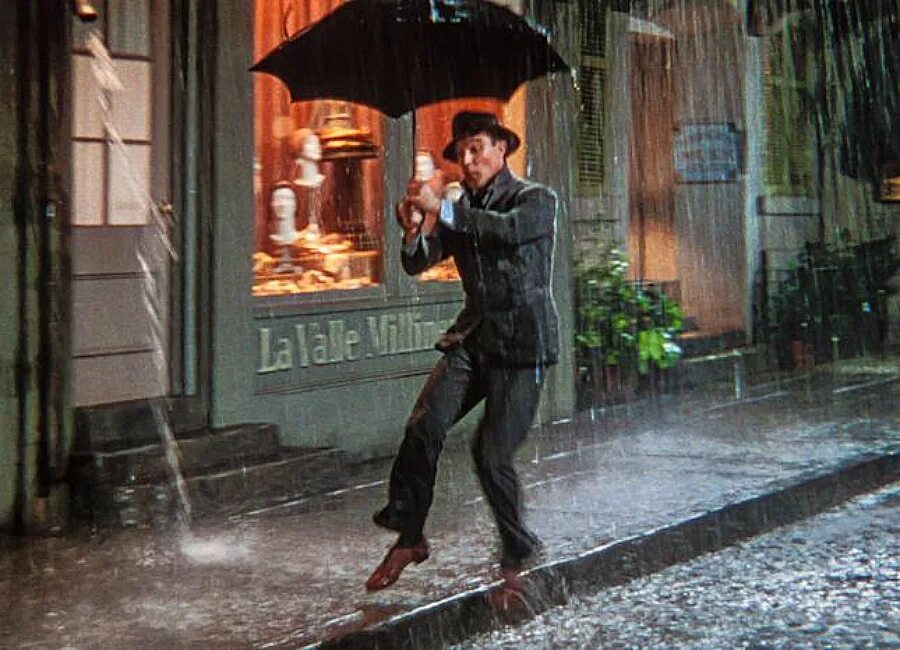 She s in the rain. Singin' in the Rain (1952). Singin’ in the Rain Джин Келли.