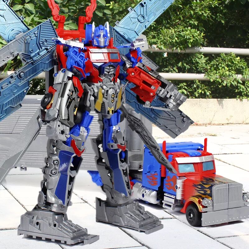 где трансформеров. сентинел прайм трансформеры прайм. робот оптимус прайм 55. трансформеры g1 оптимус прайм. Transformers бамблби игрушка.