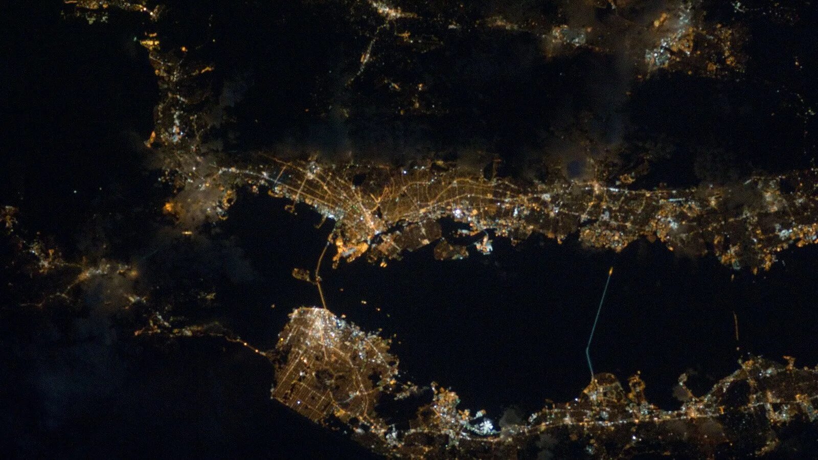 Красивый вид из космоса. Сан-франциско из космоса ночью. Космические снимки земли. Спутниковый снимок корода. Лучшие виды со спутника.